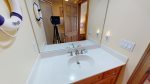 Master bathroom with single sink basin and large shower stall 